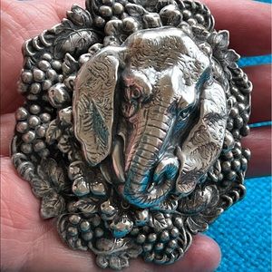 Huge multilevel sterling silver repousse lucky Elephant grapes bunches pendant?